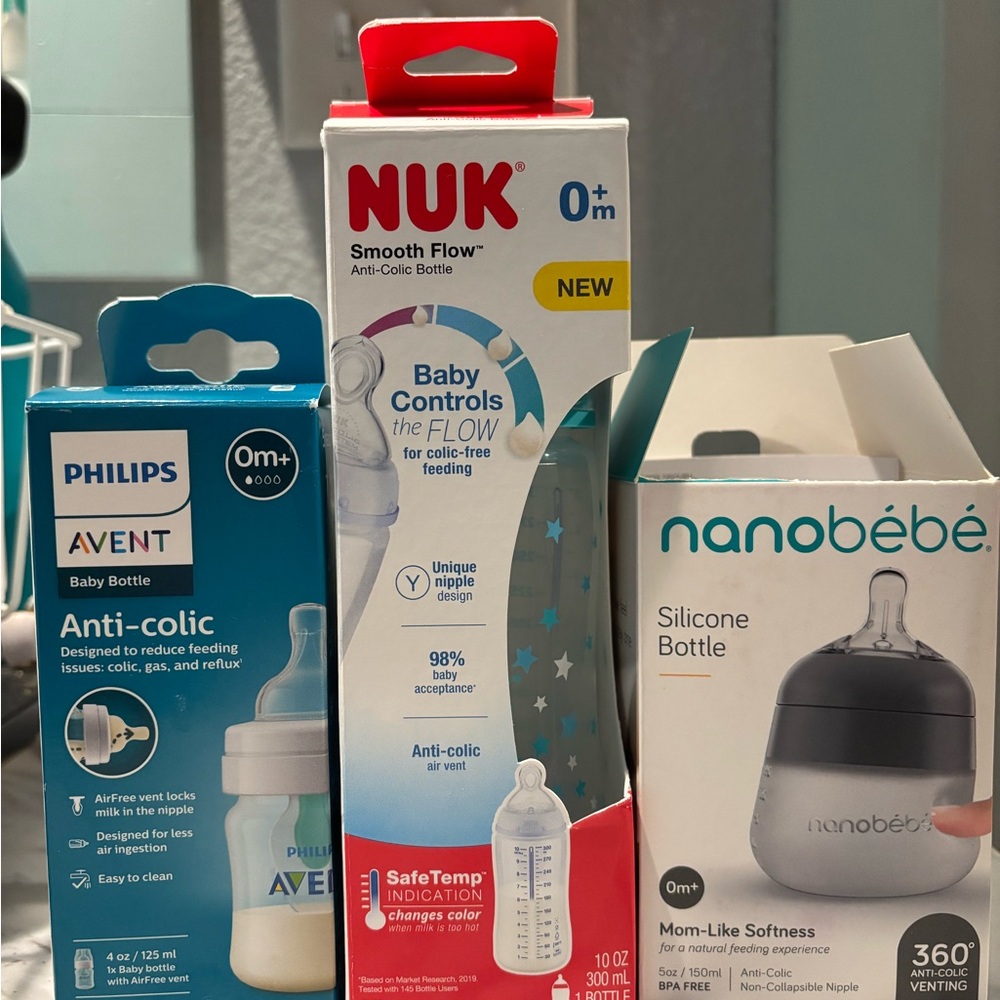 Assorted baby bottles